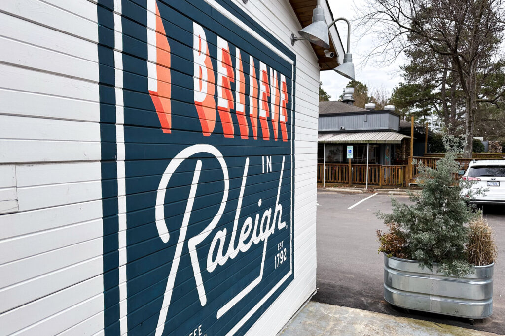 An "I Believe in Raleigh" mural outside of Sola Coffee Café.