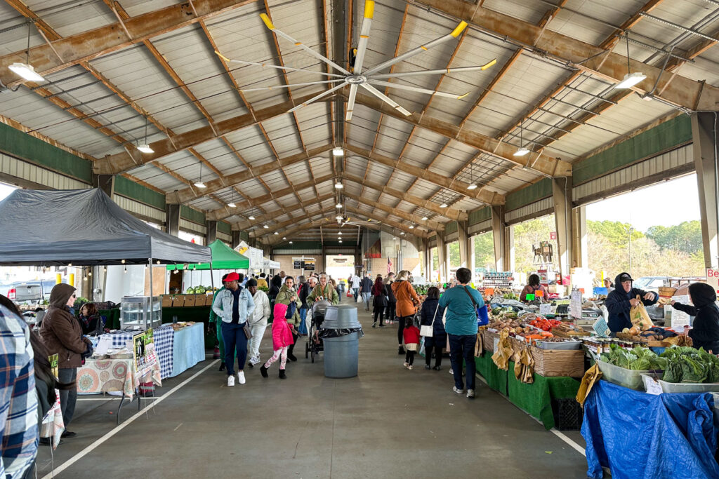 People shopping at the State Farmers Market in Raleigh, NC.